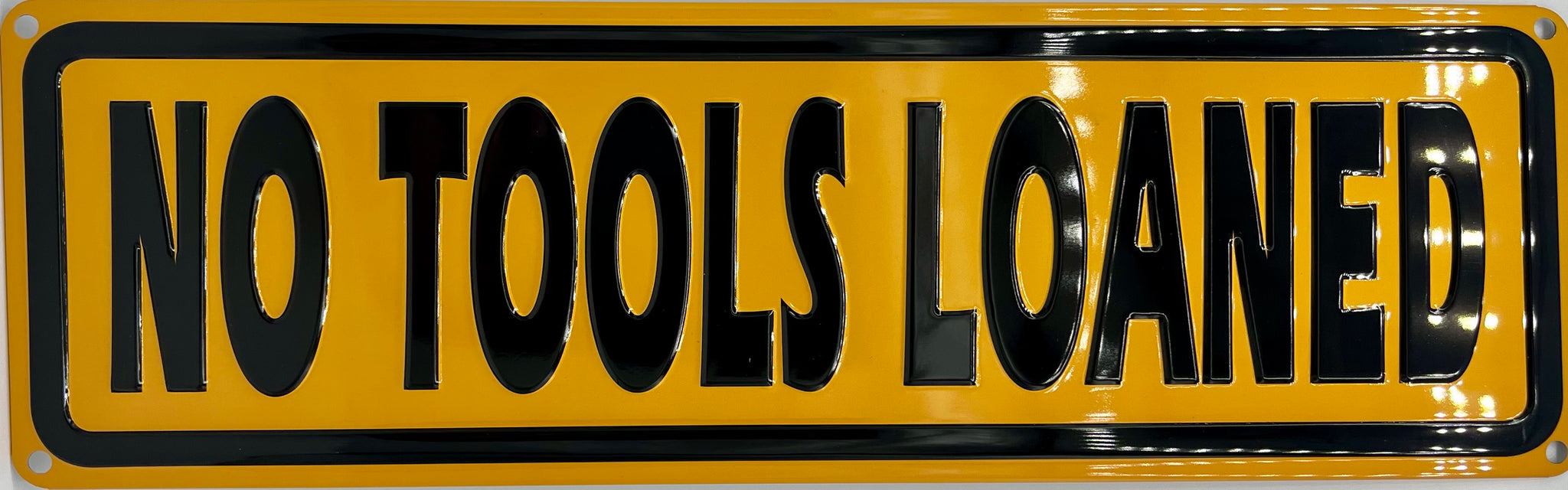 No Tools Loaned Metal Embossed Sign